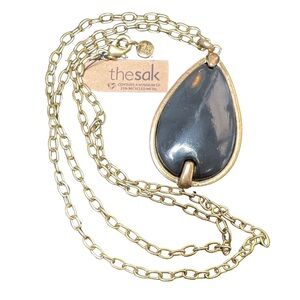 The Sak Enamel Pendant on Bronze Tone Chain
